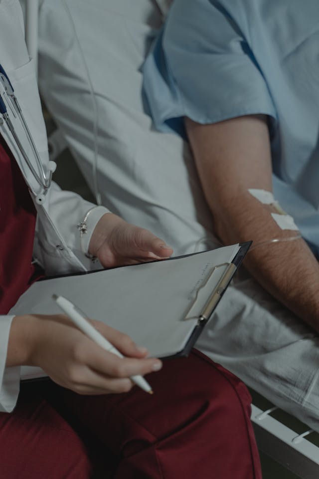 a doctor checking a patient as part of hospice care